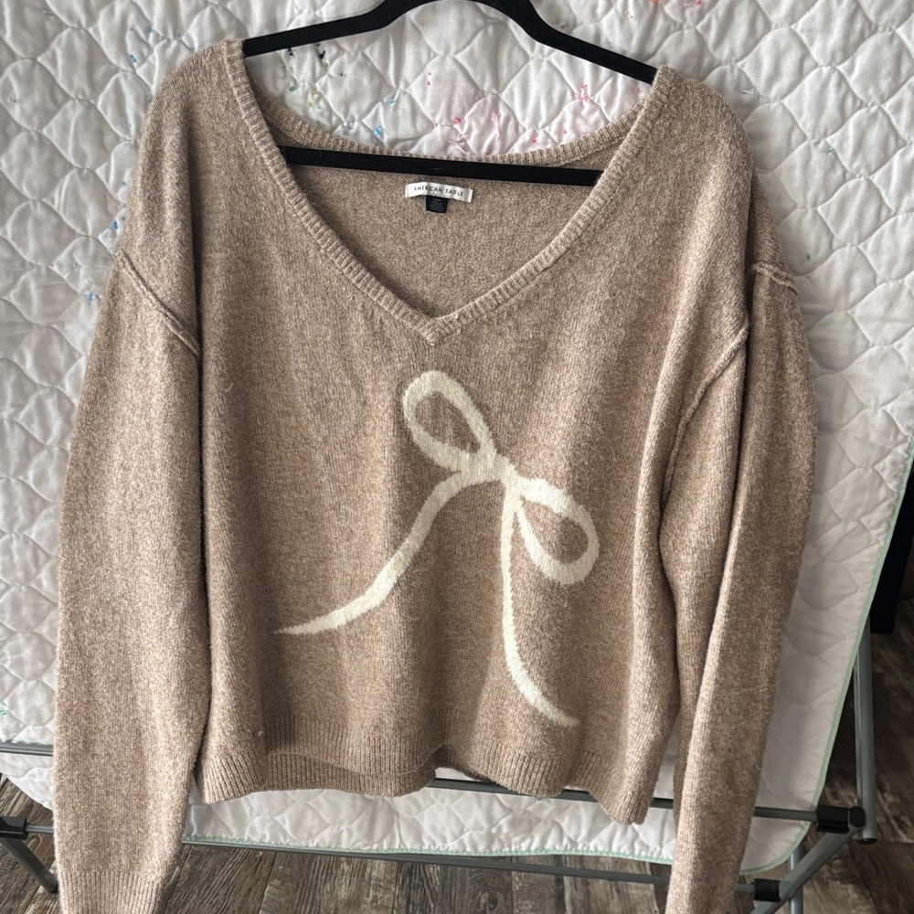 American Eagle  Beige V-Neck Sweater with W hite Bow